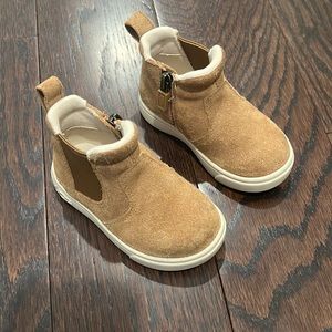 UGG tan slip on boot. Barely worn baby size 6